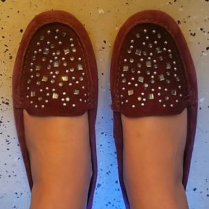 Vionic size 9 loafers. They are purple colored and leather.